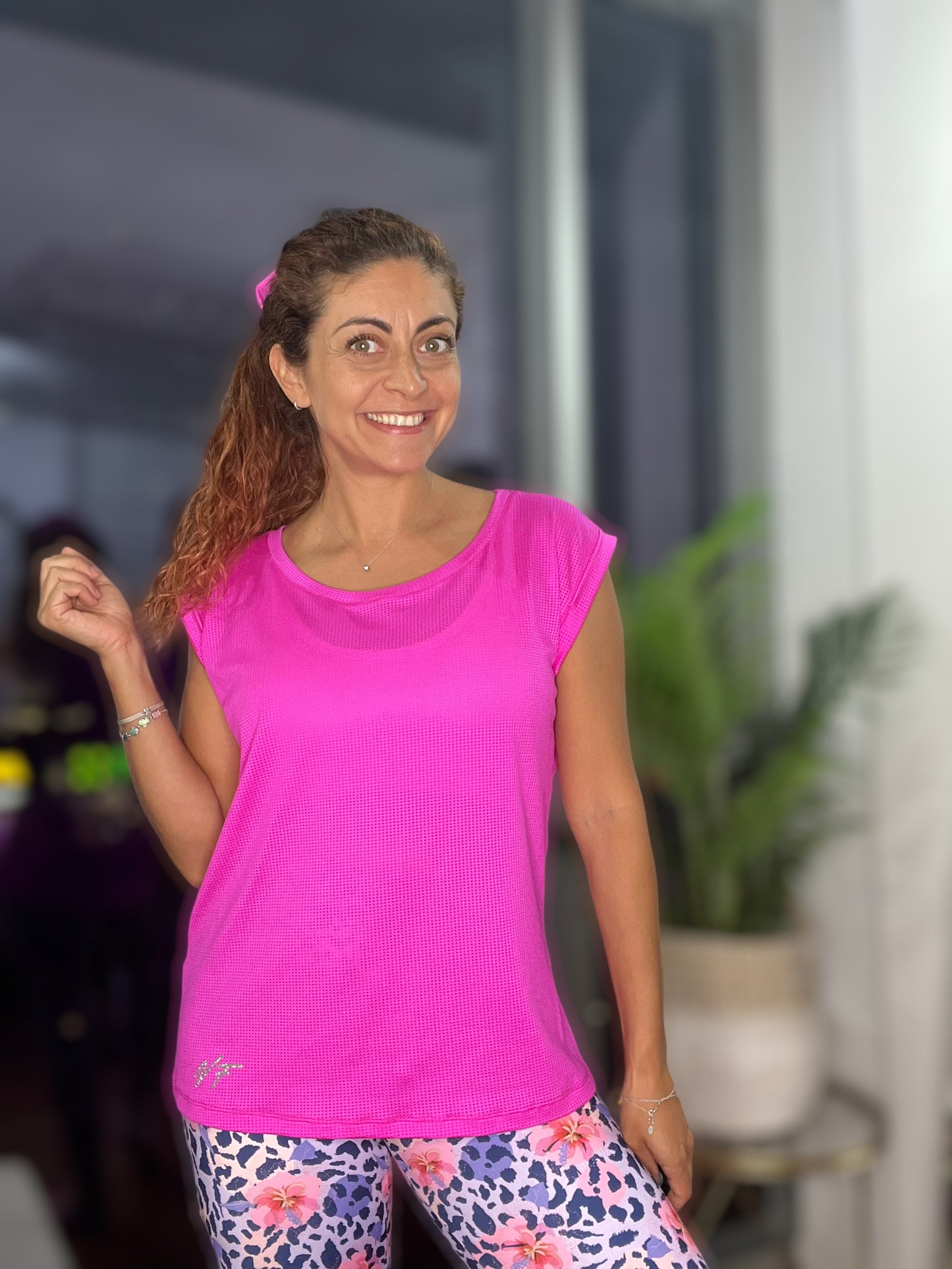 POLERA FEEL FREE FUCSIA